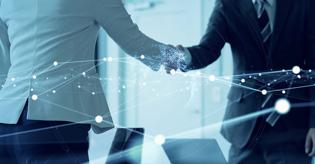 Image of two business people shaking hands with graphic depiction of network superimposed